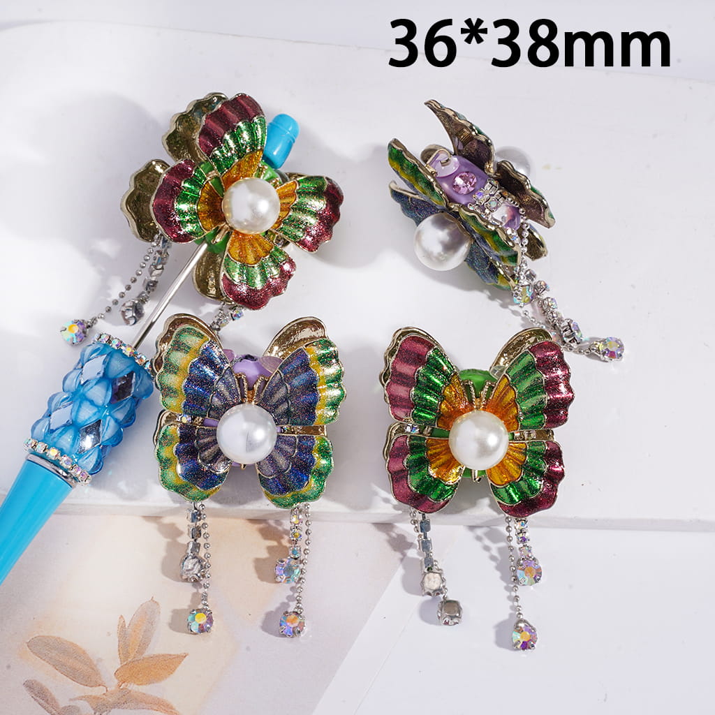 Colorful butterfly-shaped earrings with pearl centers on a white background, size 36*38mm.