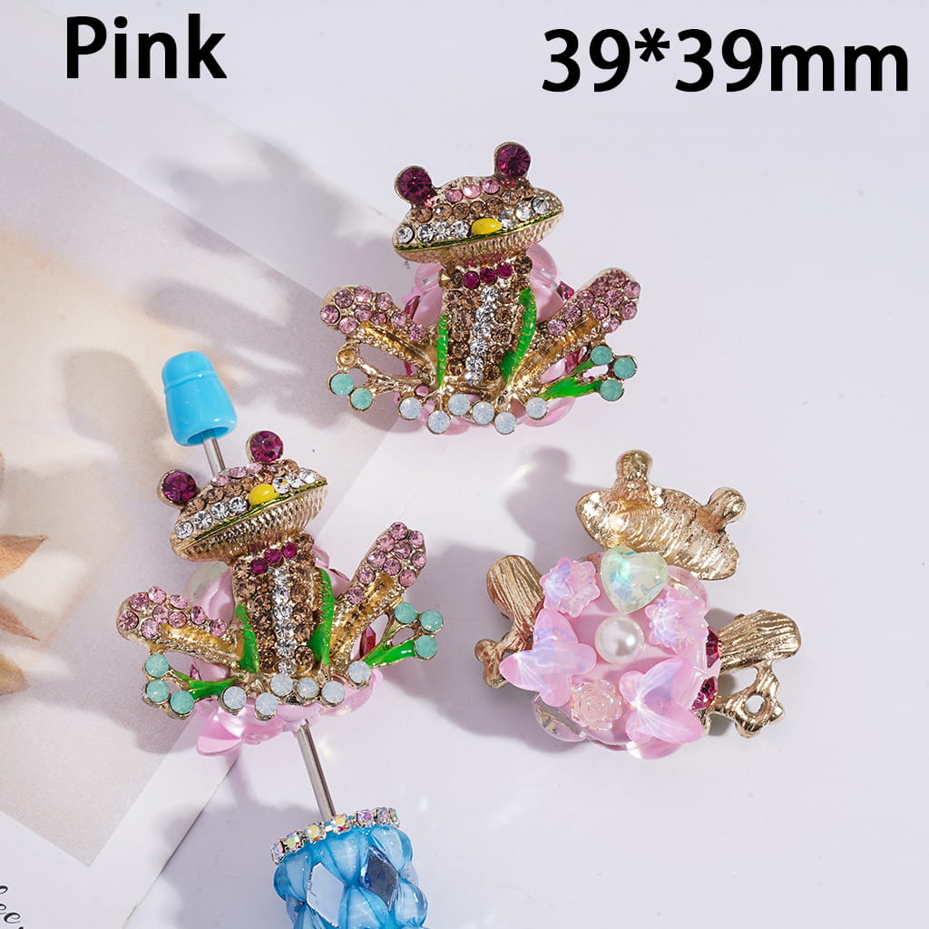 Decorative hair clips with floral and crown designs on a white background, labeled 'Pink' and '39*39mm'.

