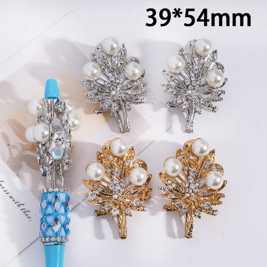 Decorative hair clips with pearls and crystals on a white background