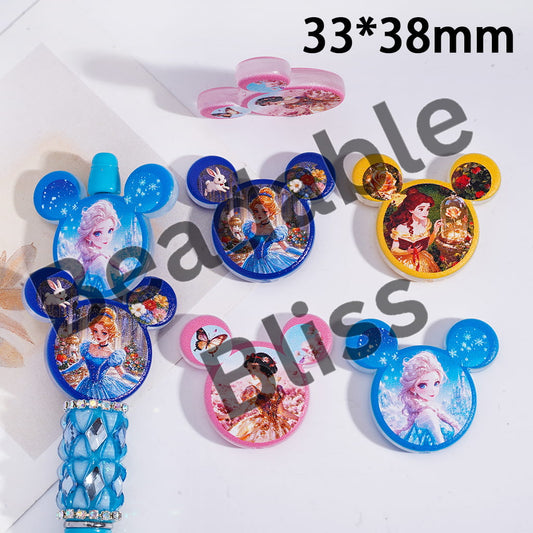 Set of Disney-themed character wands on a white background