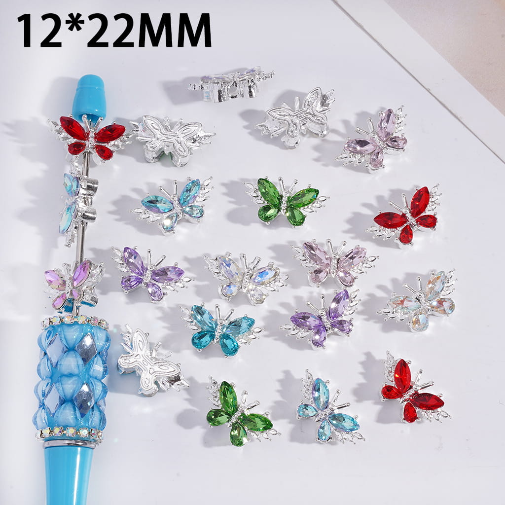 Colorful butterfly-shaped jewelry components on a white background with '12*22MM' text.