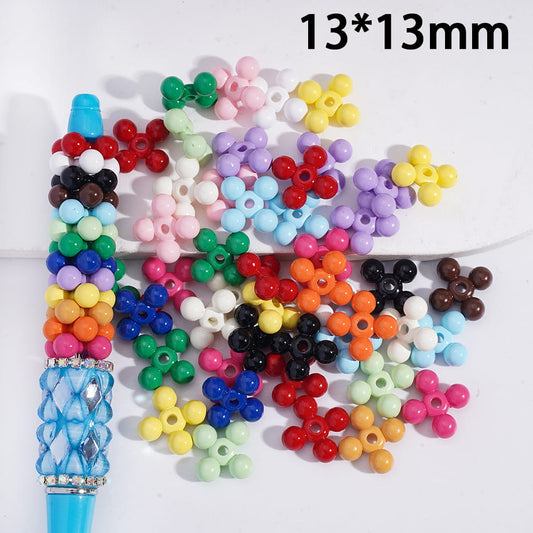 Assorted colorful beads with a white background