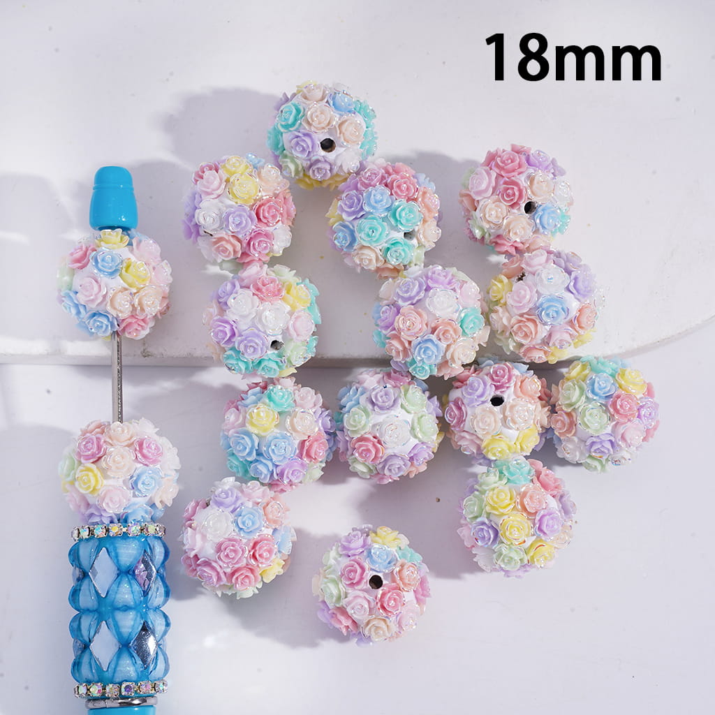Decorative letters 'S' and 'B' made of pastel-colored flowers on a white background with '18mm' text.