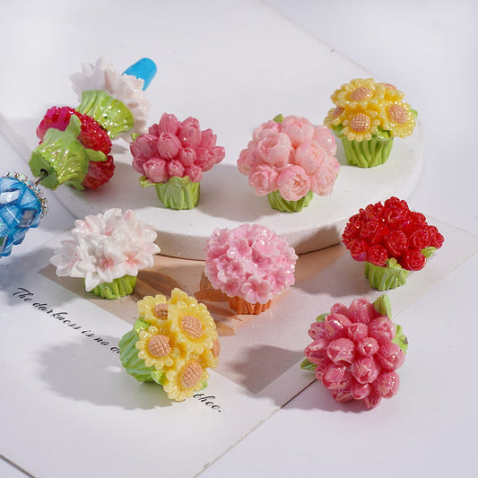 Colorful flower-shaped hair accessories on a white surface

