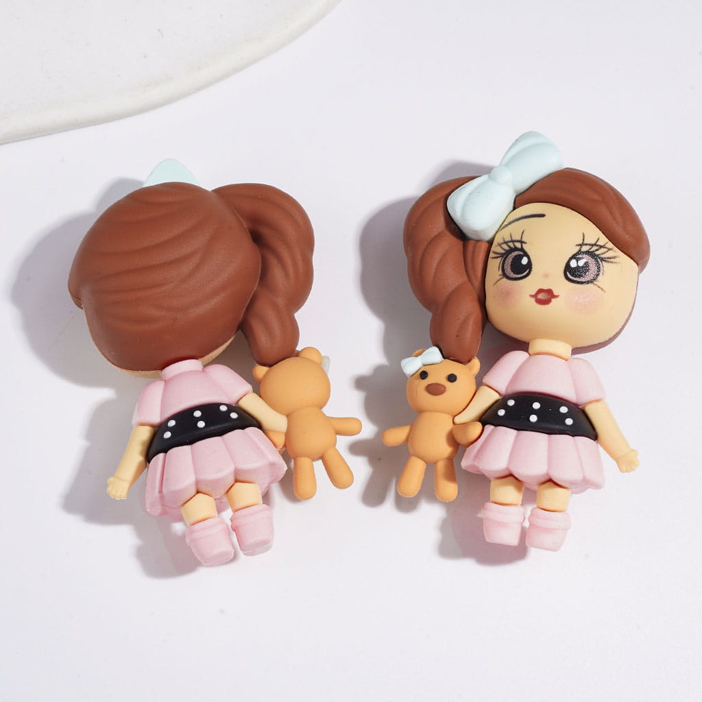 Beautiful Girl Holding a Doll in Three Style Soft PVC Rubber Figurine, 62-64MM (No-Hole)