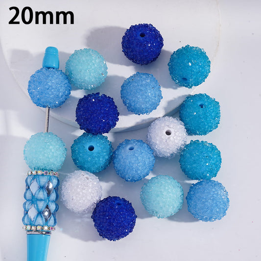 Blue and white textured beads with a measuring stick indicating 20mm on a white background.
