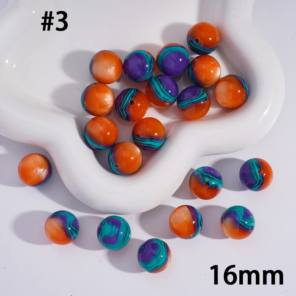 Colorful marbled beads on a white dish with '16mm' text.
