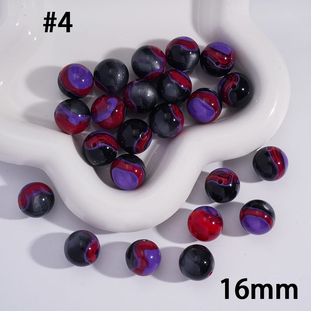 Marbles with purple and red swirls on a white dish, labeled '#4' and '16mm'.