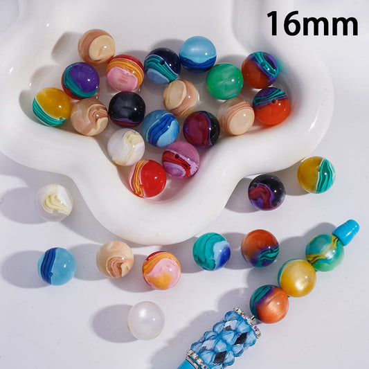 Colorful marbled beads on a white dish with '16mm' text