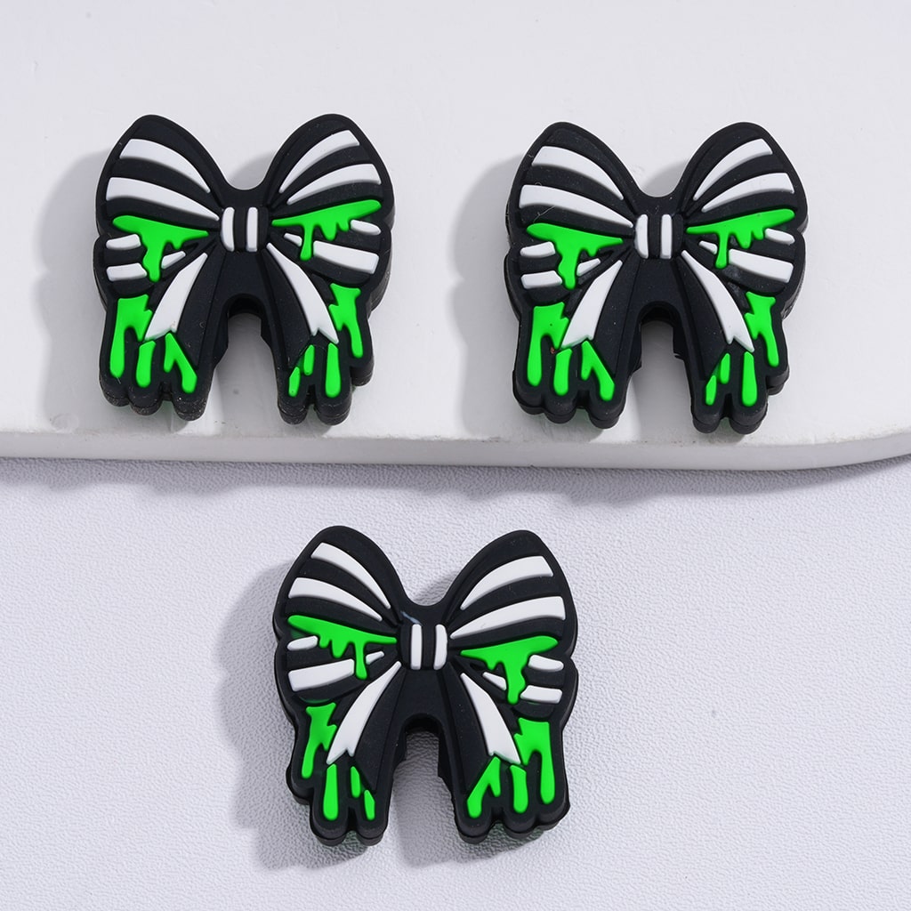Silicone Focal Beads Black-White Bowknot with Green Liquid Prints