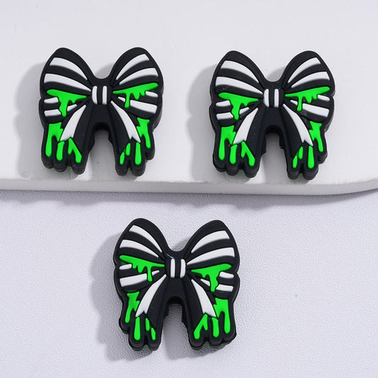 Silicone Focal Beads Black-White Bowknot with Green Liquid Prints