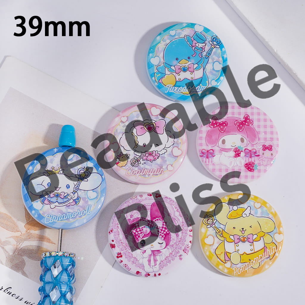 Set of colorful character buttons with 'handsontupply.com' branding.