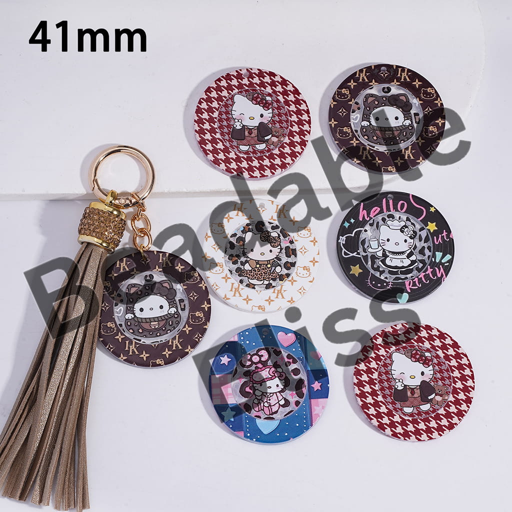 Set of keychains and coasters with cartoon character design on a white background