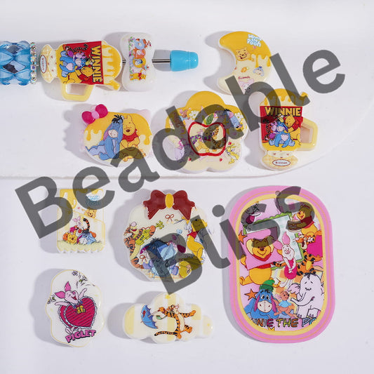 Collection of Winnie the Pooh-themed items on a white background with 'handsontosupply' branding.