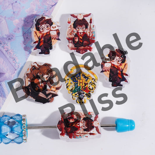 Set of decorative pins with character designs on a white background
