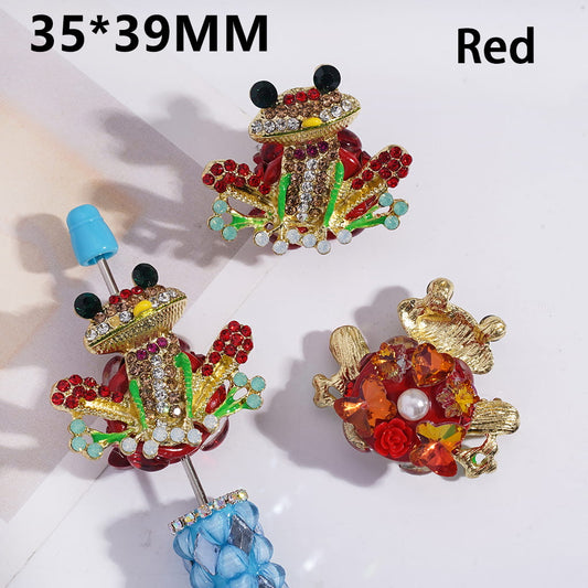 Colorful brooches with gemstones on a white background


