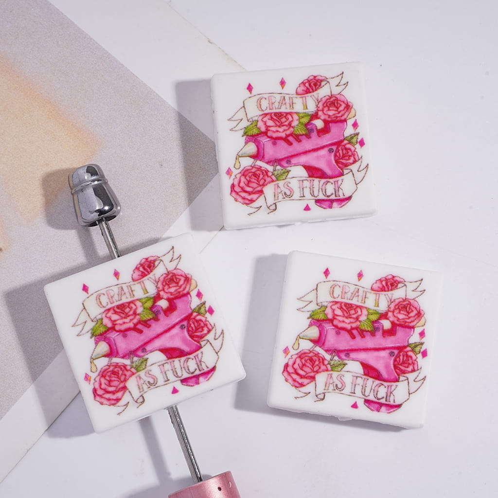 Silicone Focal Beads with Pink Hot Glue Surround by Rose Flower and Text "Crafty AS HUMOR", Flat Square Shape