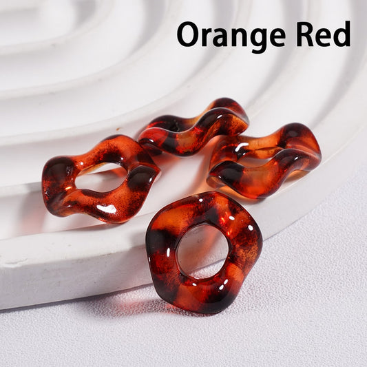 Orange red hair accessories on a white background

