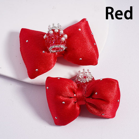 Two red bows with decorative elements on a white background, labeled 'Red'.

