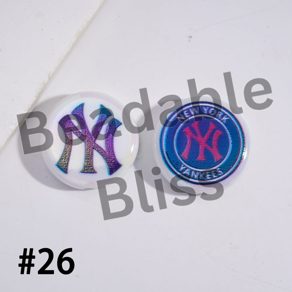Two New York Yankees pins on a white background with 'Beadable Bliss' branding.


