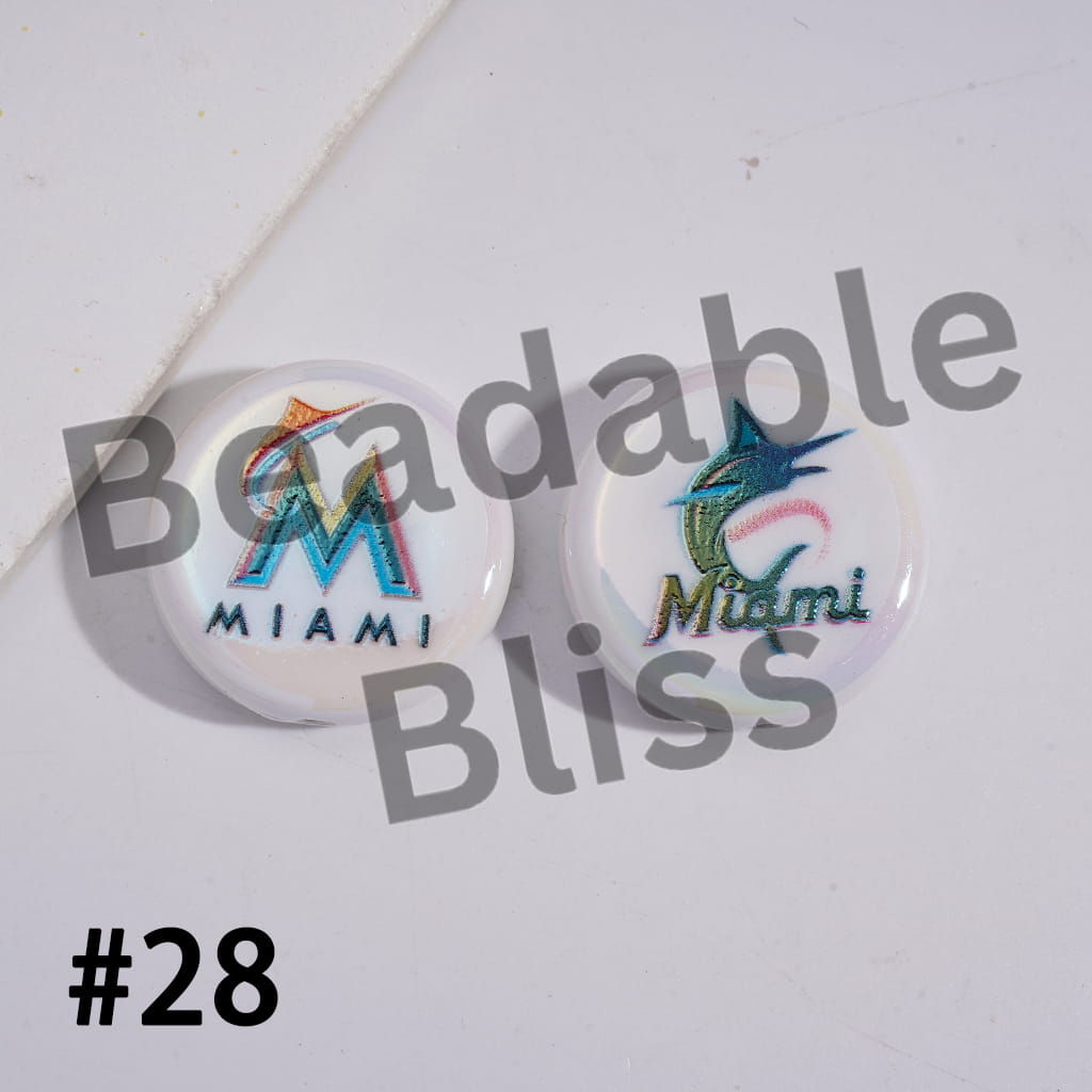 Two round pins with 'Miami' text and logo on a white background, branded 'Beadable Bliss'.

