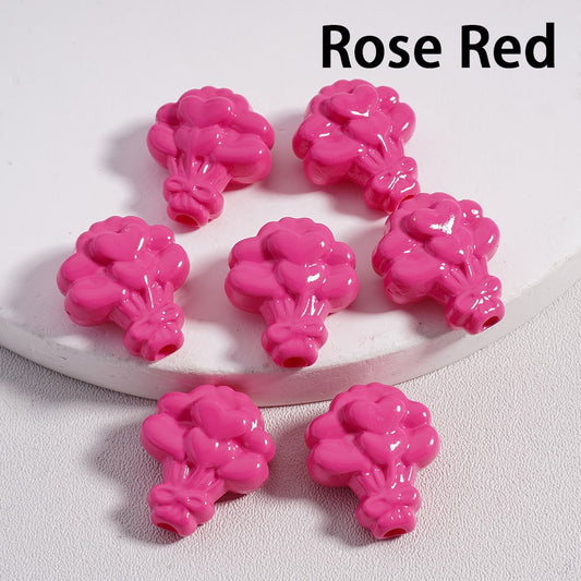 Rose red cauliflower-shaped beads on a white plate with 'Rose Red' text above.

