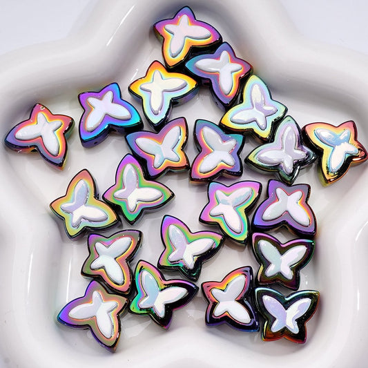 Iridescent star-shaped objects on a white plate


