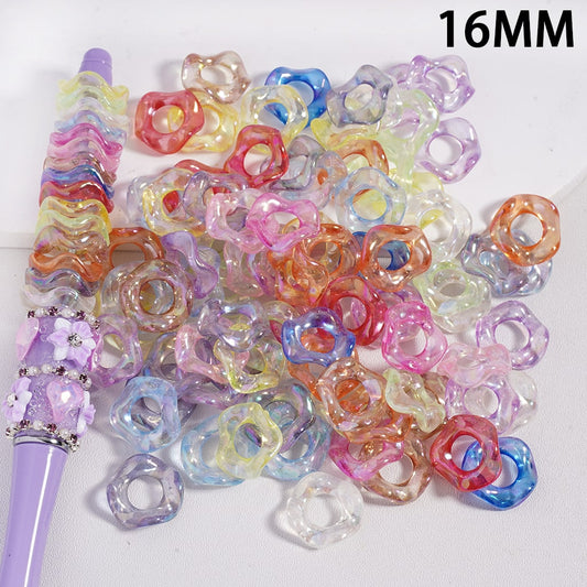 Colorful plastic beads with a purple tool on a white background, labeled '16MM'.