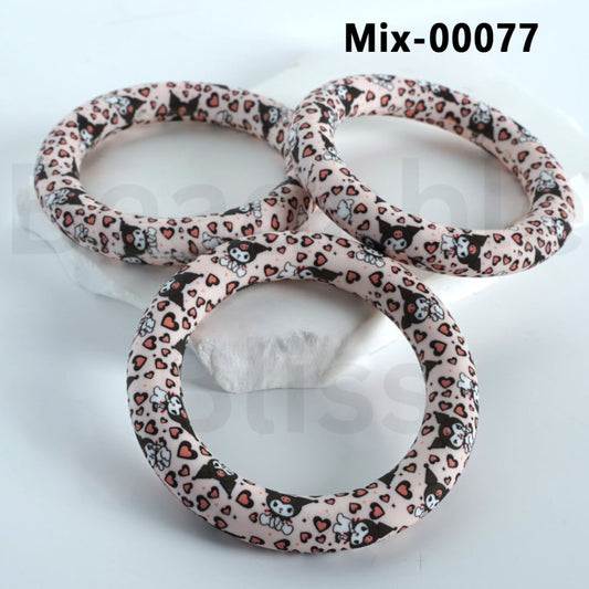 A set of silicone ring frames with a pattern of Kuromi and other characters from Sanrio.

