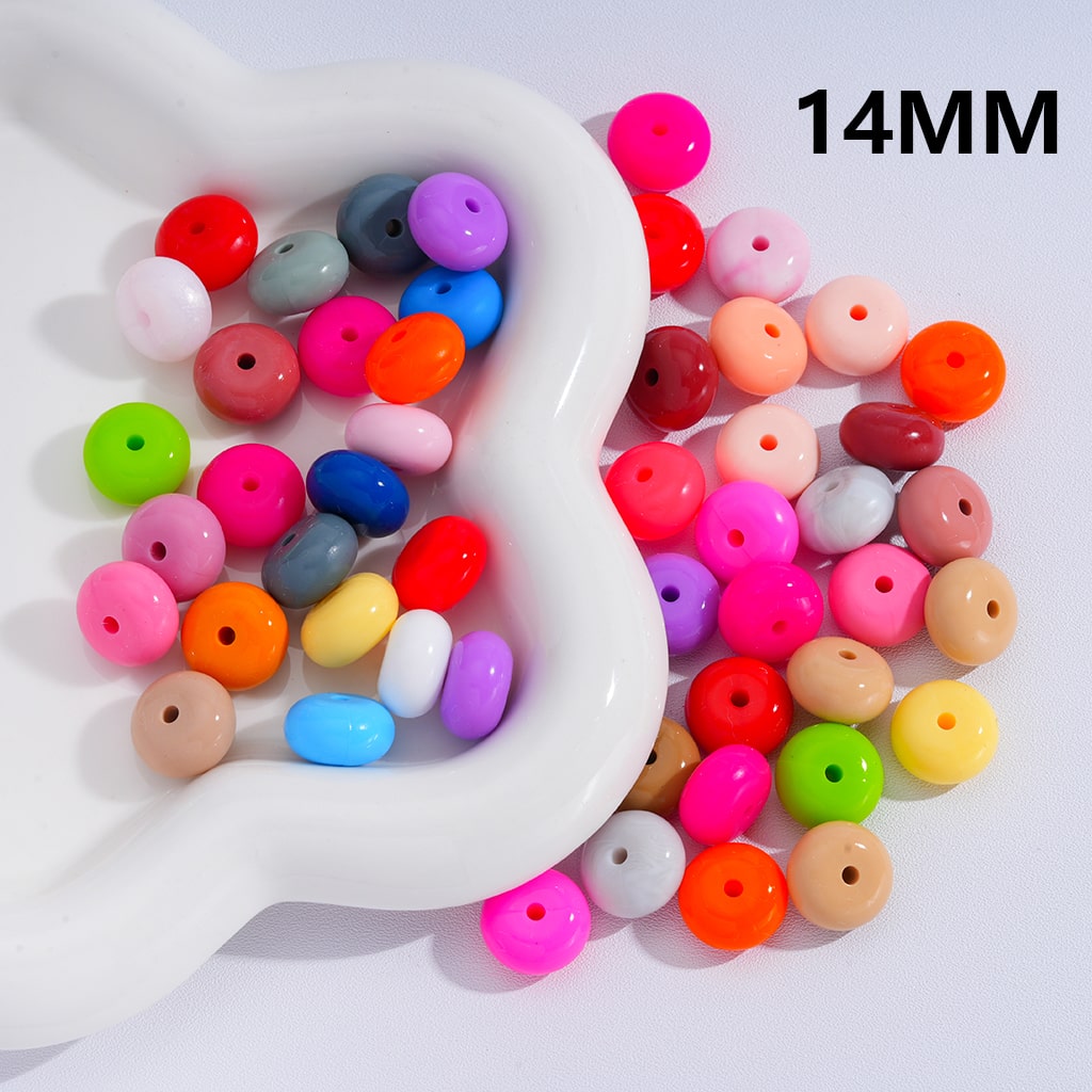 Colorful beads in a white dish with '14MM' text on a light background

