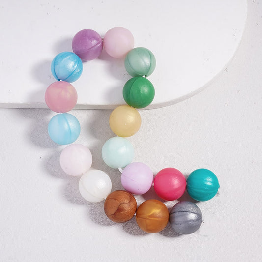 Colorful beaded bracelet on a white background
