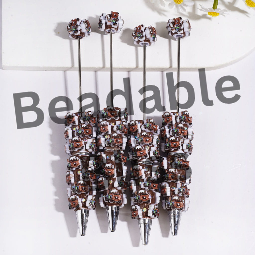 Beadable Clay Pens with Sports Car Character and AB Rhinestones on Brown Background