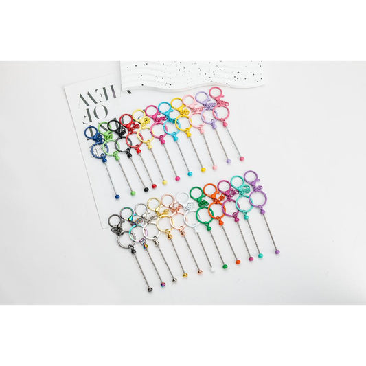 Set of colorful keychains on a white background


