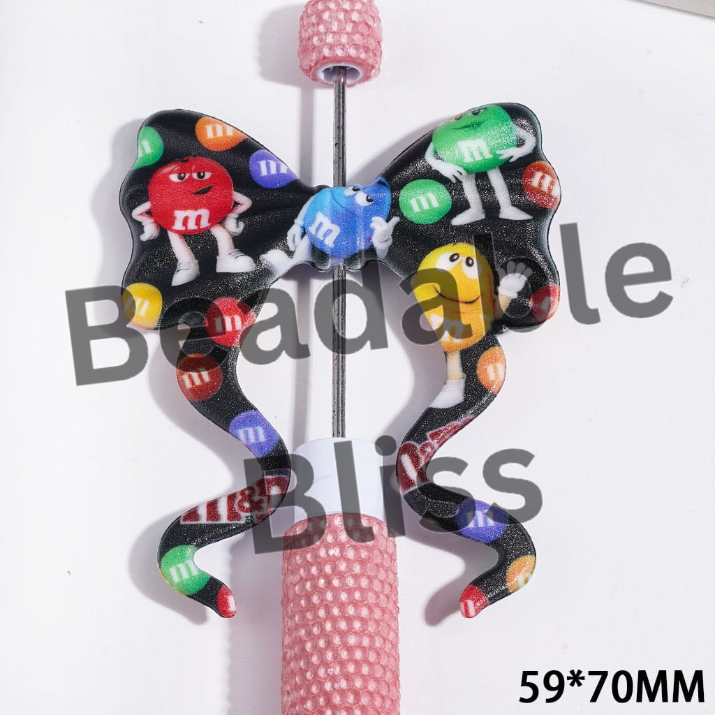 Printed PVC Soft Rubber Beads, Bowknot with Long Ribbon and Candy Chip Patterns, Black Background, 59*70MM