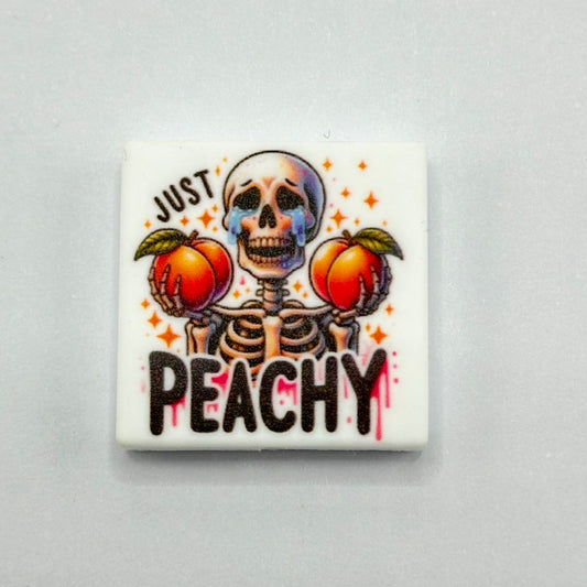 Crying Skeleton Holding Peaches saying ''Just Peachy'' Silicone Focal Beads