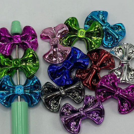 光沢のあるボウタイリボン ボトノット アクリルビーズ メタリックカラー 23*32mm ランダムミックス