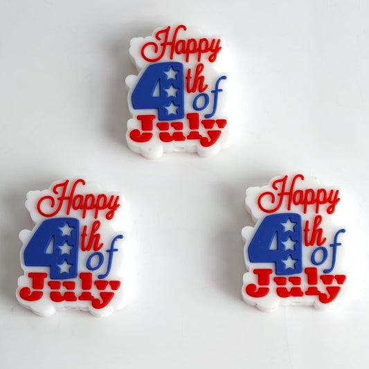Silicone beads with the text 'Happy 4th of July' and patriotic colors red, white, and blue

