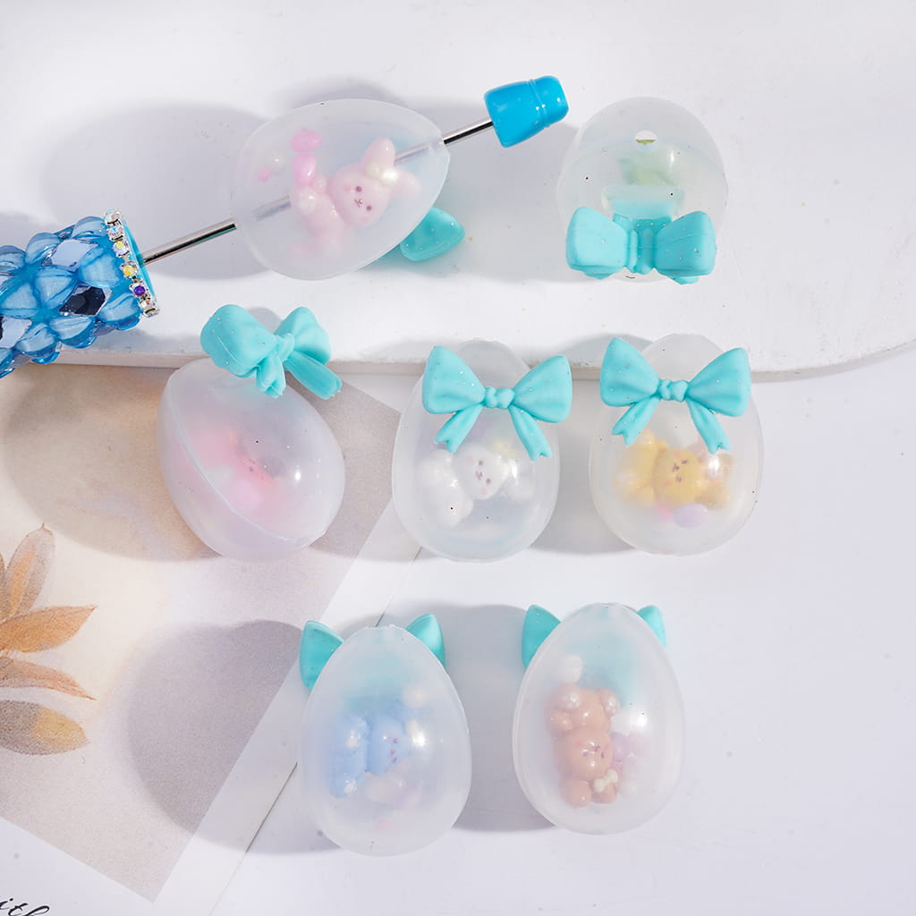 Decorative hair accessories with bows and animal shapes on a white background