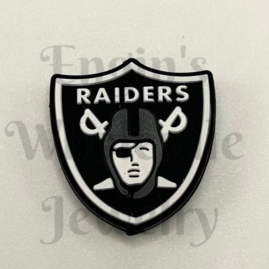 Oakland Raiders logo on a shield shape with a helmeted face in the center.

