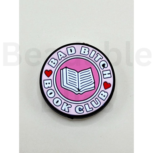 Circular badge with 'Bad Bitch Book Club' text and book illustration on a white background

