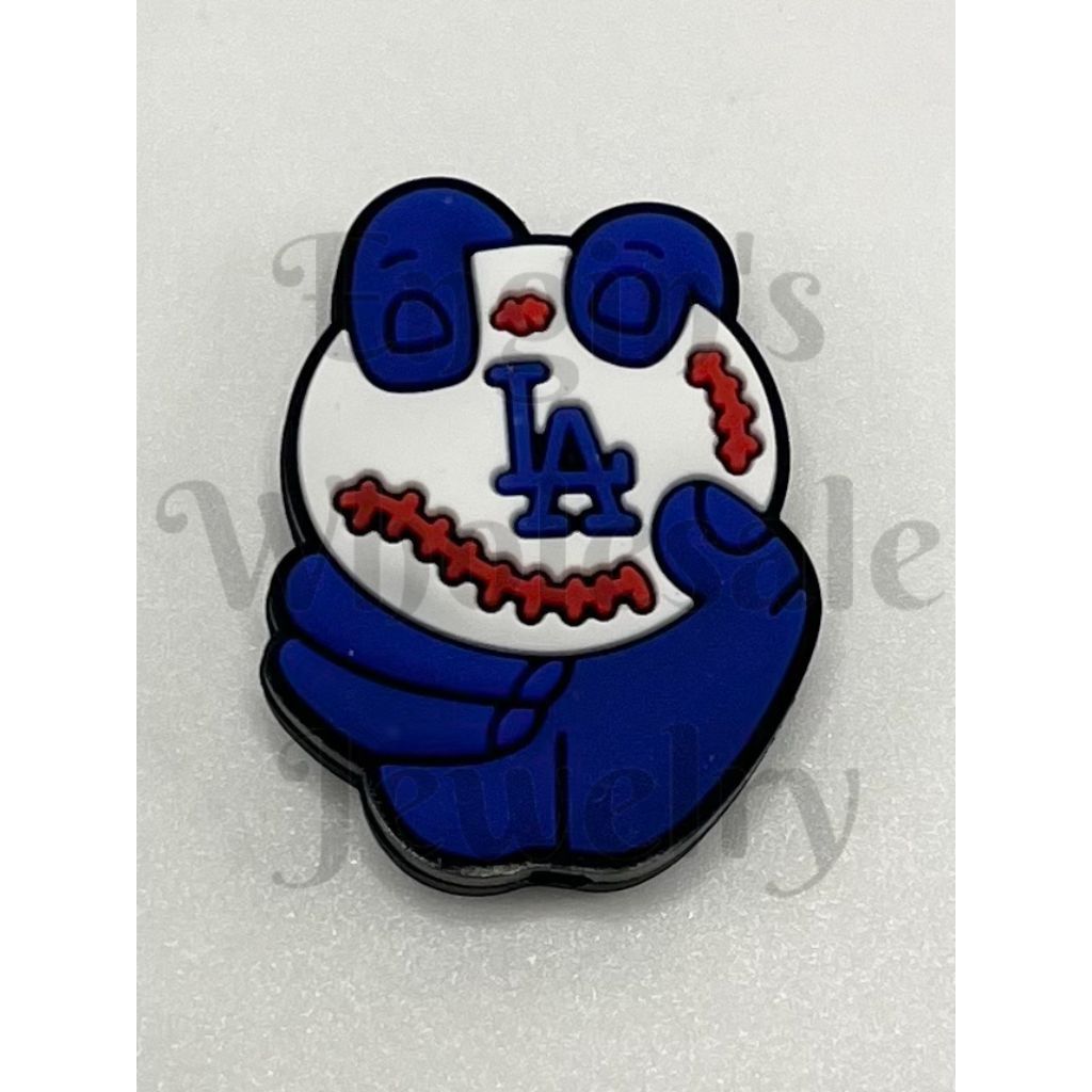 Blue glove holding a skull with 'LA' logo on a white background

