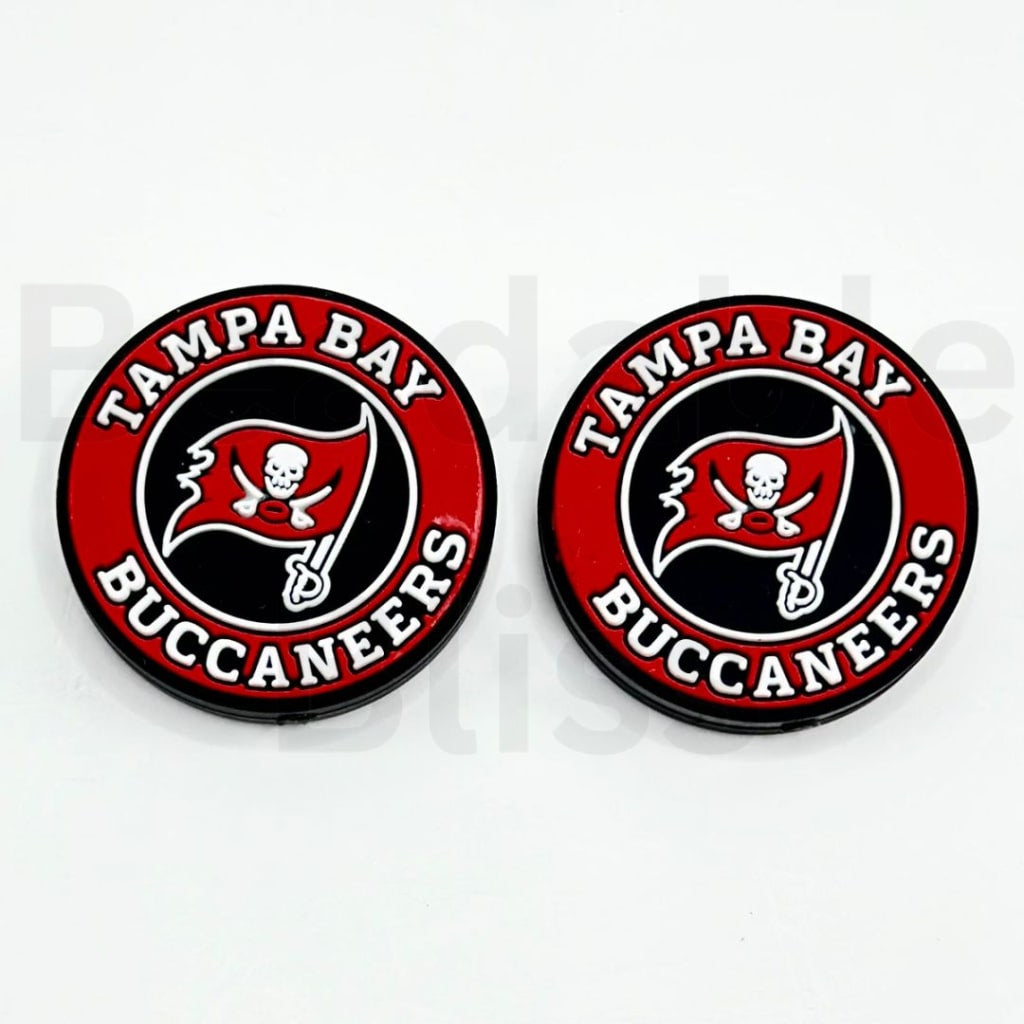 Two Tampa Bay Buccaneers logo buttons on a white background

