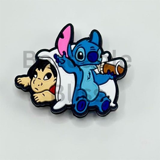 Pin featuring a blue character and a brown character on a light gray background

