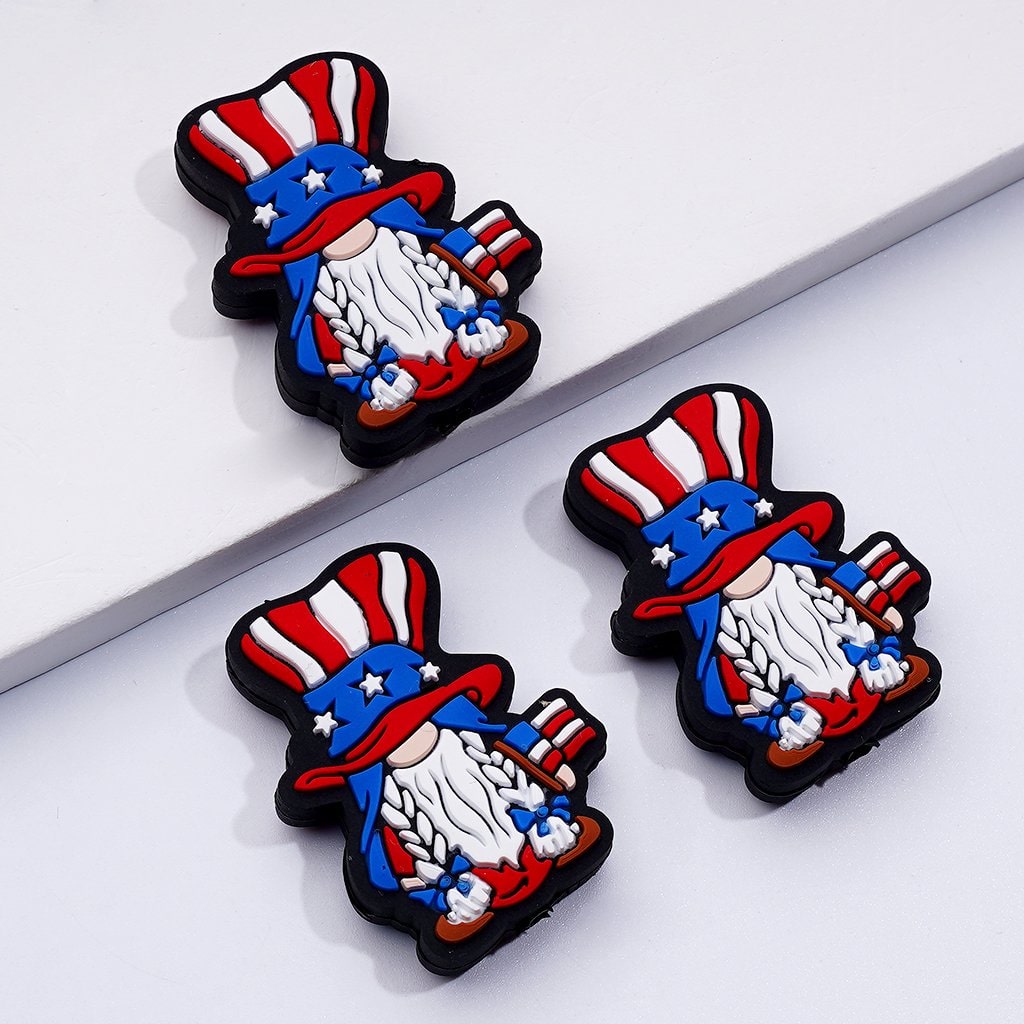 A set of silicone beads featuring a cute gnome with a USA American Flag style hat.

