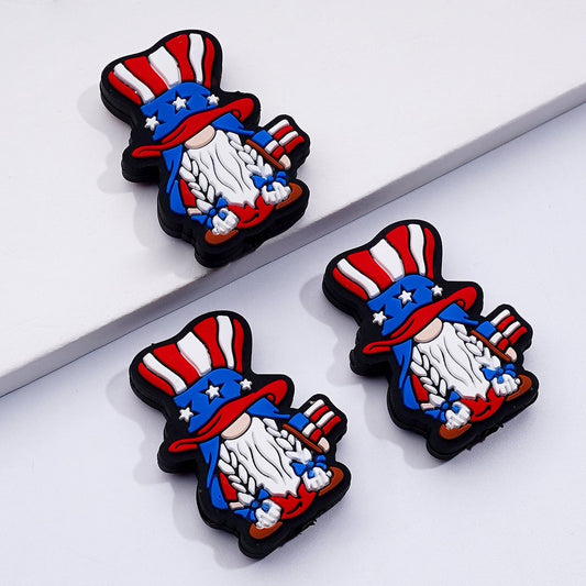 A set of silicone beads featuring a cute gnome with a USA American Flag style hat.

