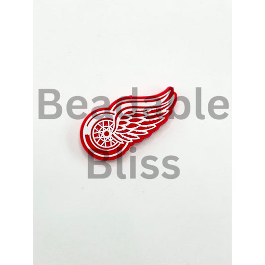 Red and white logo on a white background

