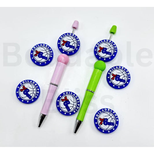 Two pens with blue circular logos featuring a logo and text on a white background.

