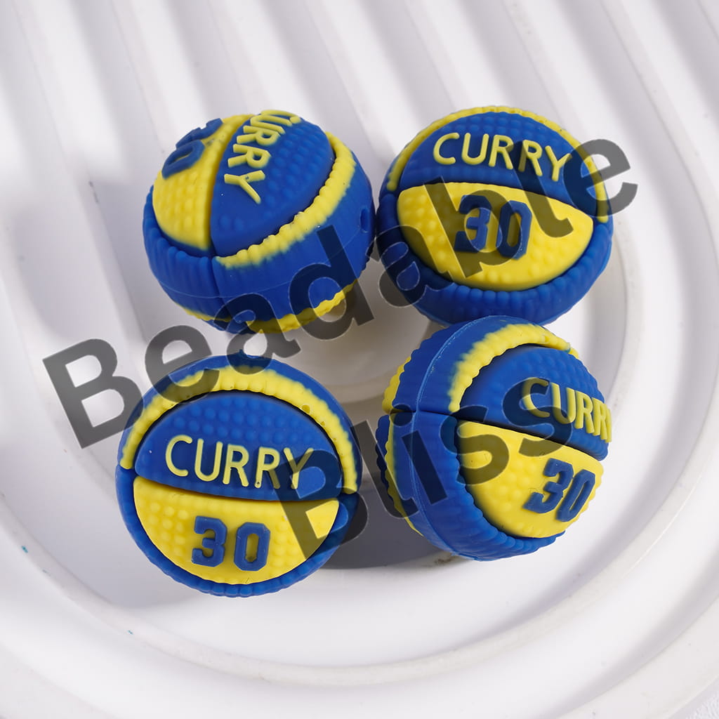 Four blue and yellow basketball-shaped earrings with 'Curry 30' text on a white background.