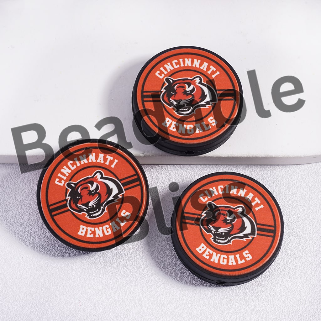 Three Cincinnati Bengals logo car air fresheners on a white background


