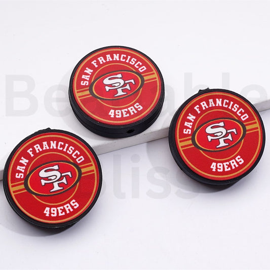 Three San Francisco 49ers logo coasters on a white background

